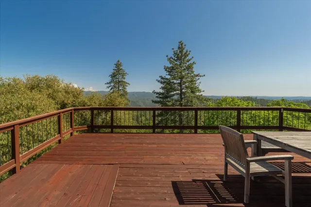a view of a chairs on roof deck