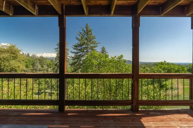 a view of a street from a balcony
