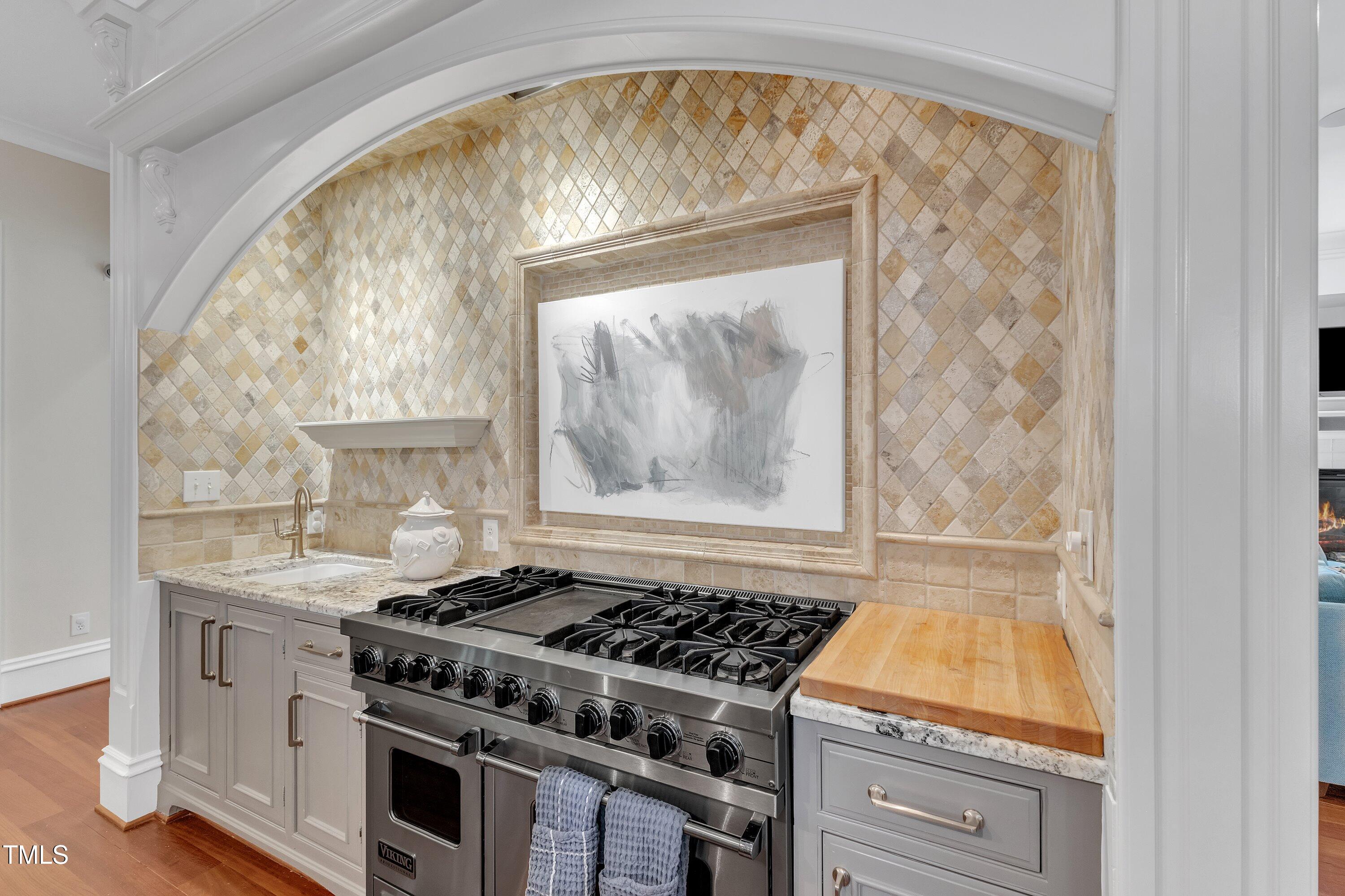 2117 Buckingham Road Raleigh, NC 27607 - Photo 17 of 82 a stove top oven sitting inside of a kitchen