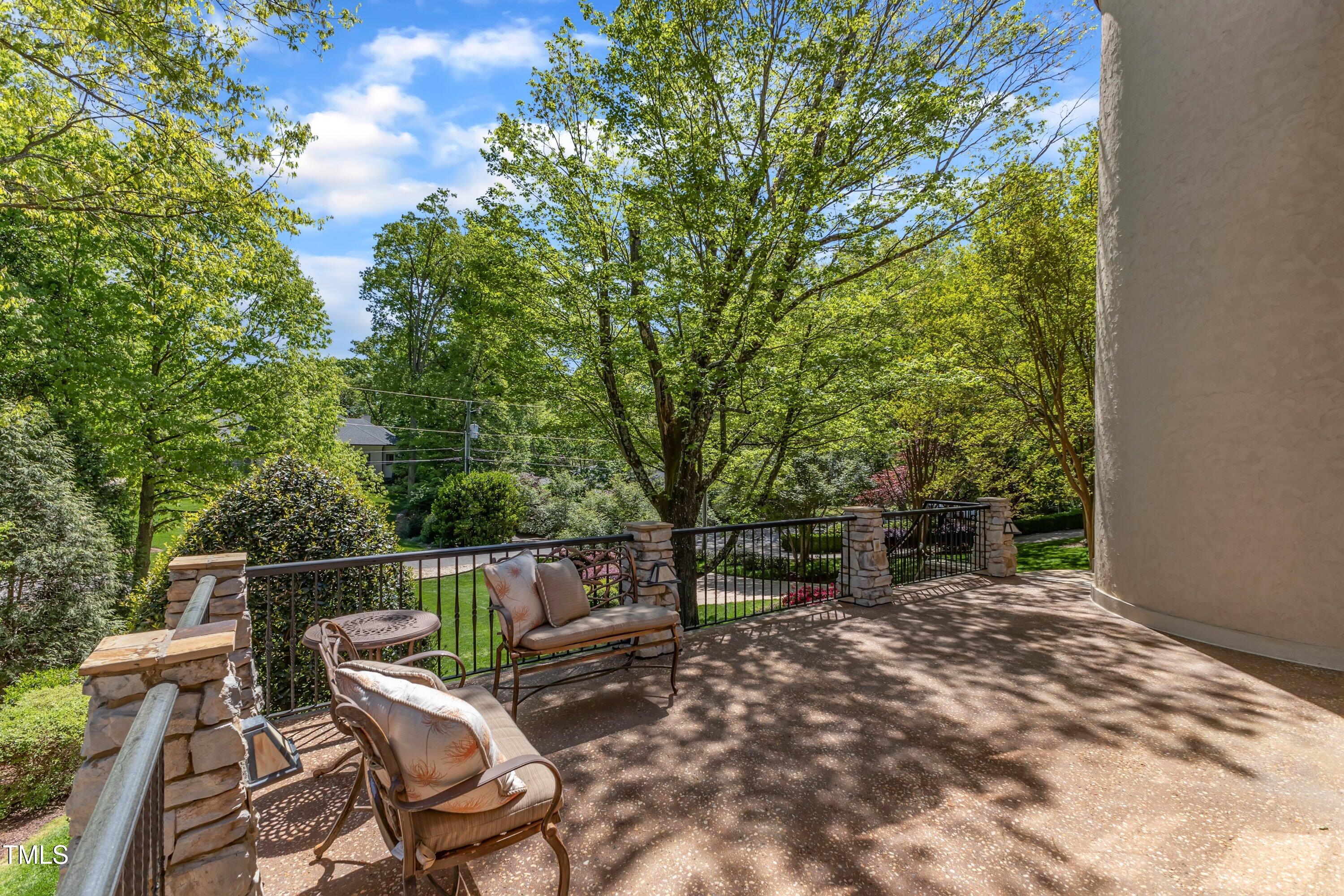 2117 Buckingham Road Raleigh, NC 27607 - Photo 25 of 82 a view of a chair and fire pit in the backyard