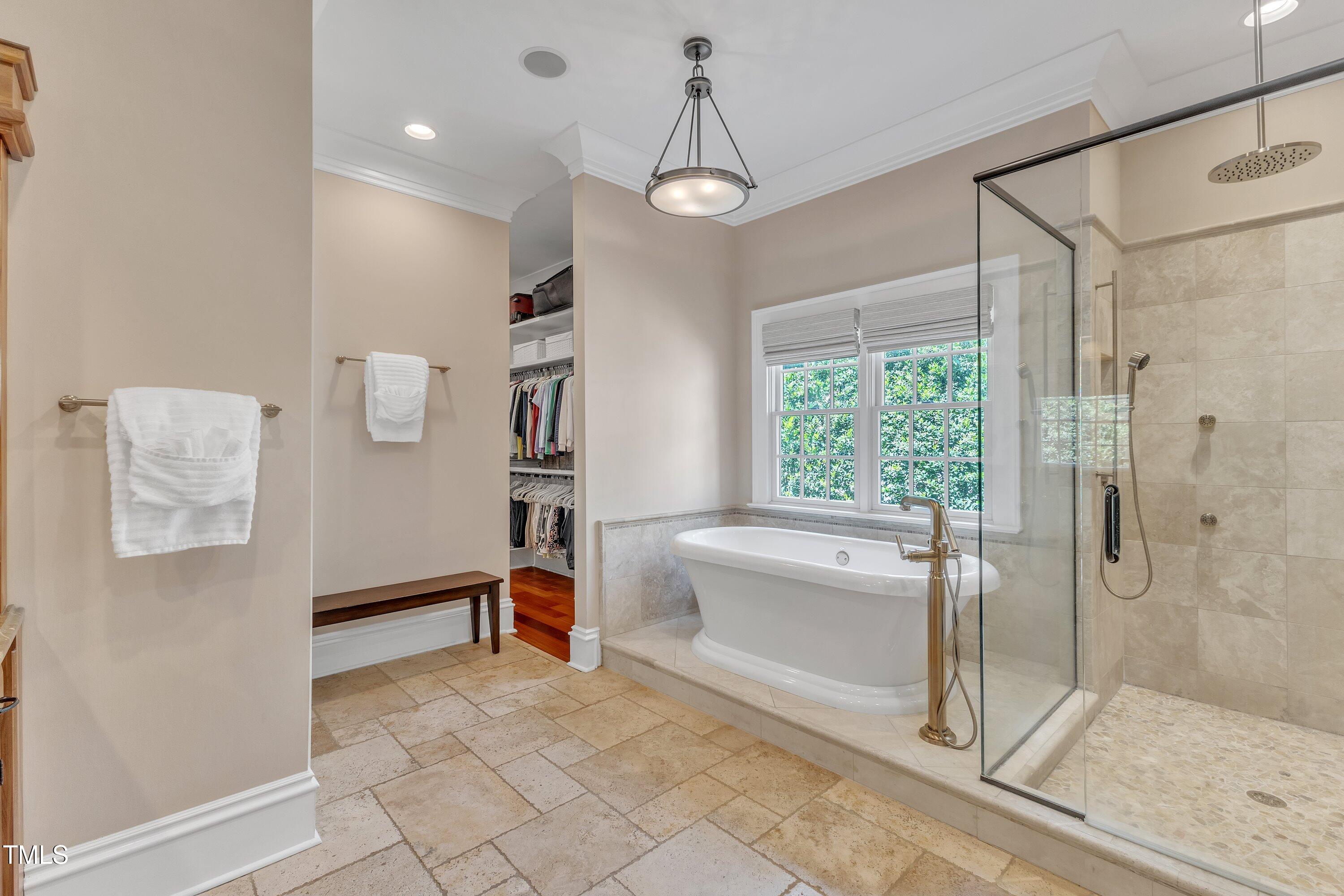 2117 Buckingham Road Raleigh, NC 27607 - Photo 31 of 82 a spacious bathroom with a granite countertop sink a toilet and shower