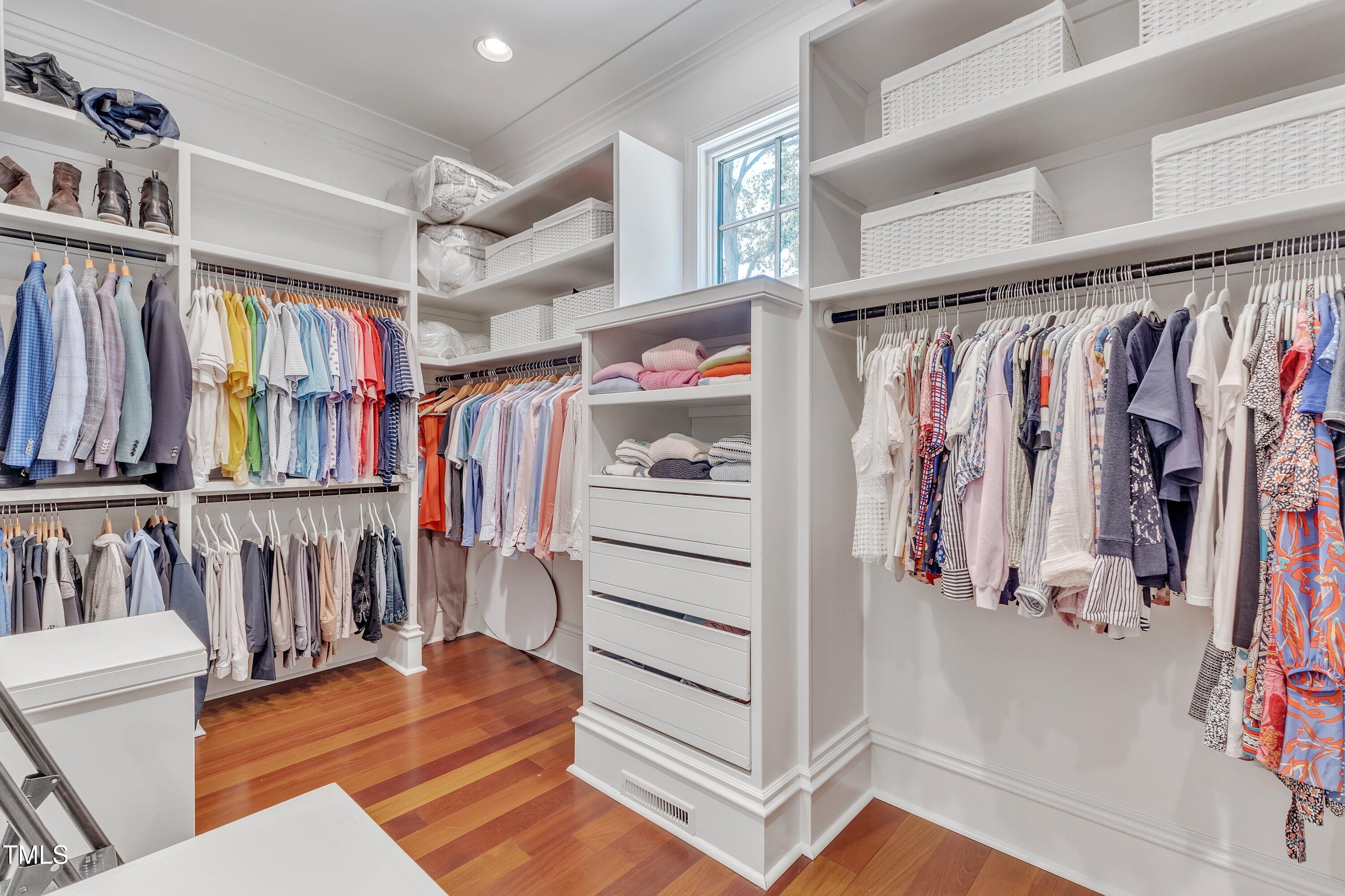 2117 Buckingham Road Raleigh, NC 27607 - Photo 33 of 82 a view of walk in closet with clothes and shoes