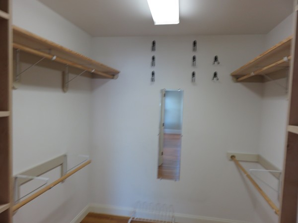 46 Harris Road Newton, MA 02465 - Photo 13 of 28 a bathroom with a shower and closet