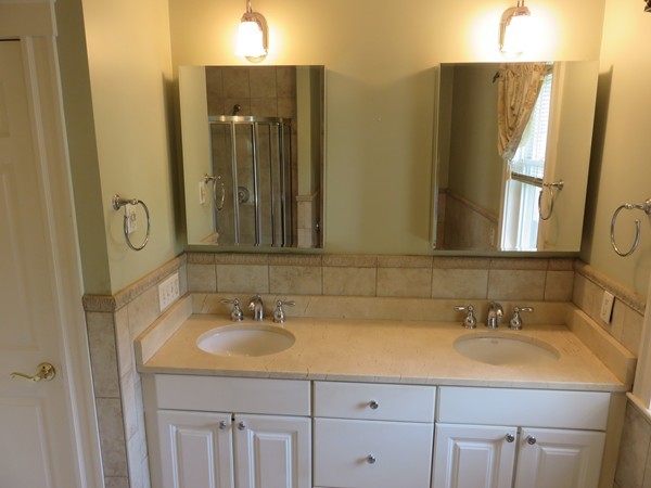46 Harris Road Newton, MA 02465 - Photo 15 of 28 a bathroom with a sink and a mirror