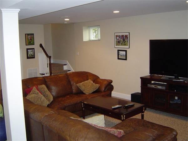 46 Harris Road Newton, MA 02465 - Photo 18 of 28 a living room with furniture and a flat screen tv