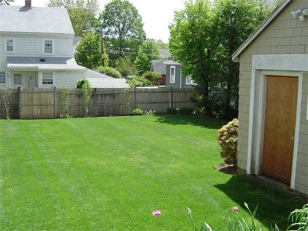 46 Harris Road Newton, MA 02465 - Photo 22 of 28 a front view of a house with garden