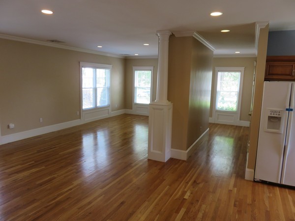 46 Harris Road Newton, MA 02465 - Photo 3 of 28 a view of empty room with wooden floor and fan