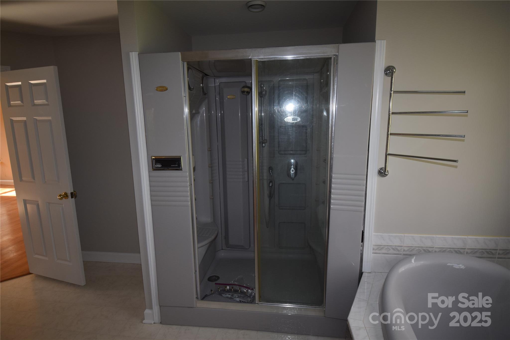 809 Pine Forest Road Charlotte, NC 28214 - Photo 21 of 36 a bathroom with a shower and toilet