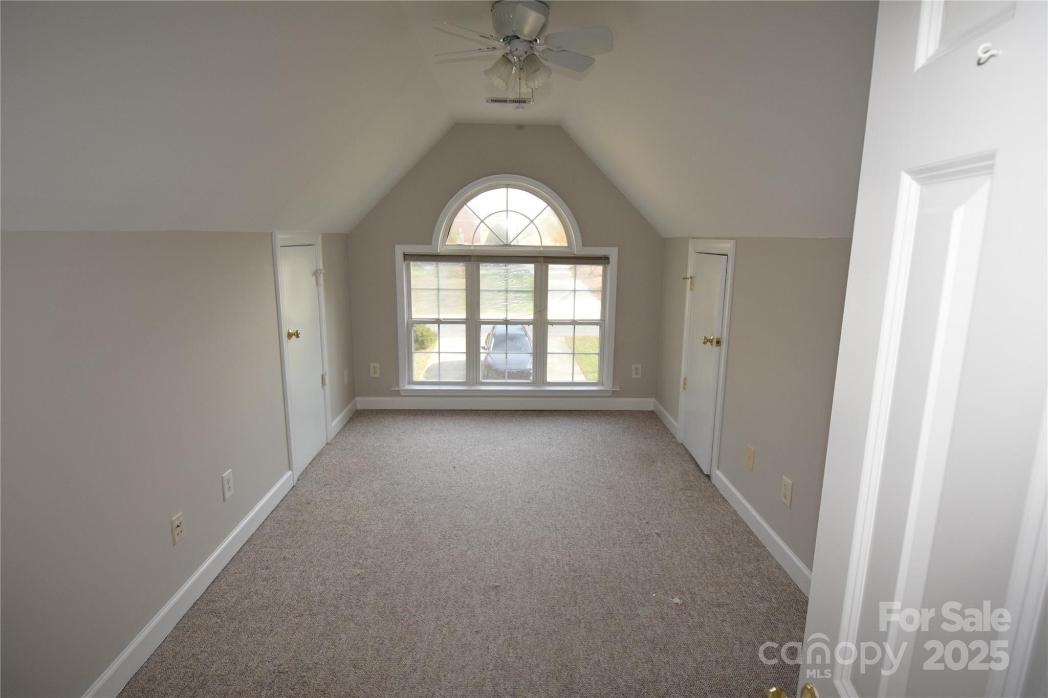 809 Pine Forest Road Charlotte, NC 28214 - Photo 23 of 36 an empty room with windows and mountain view