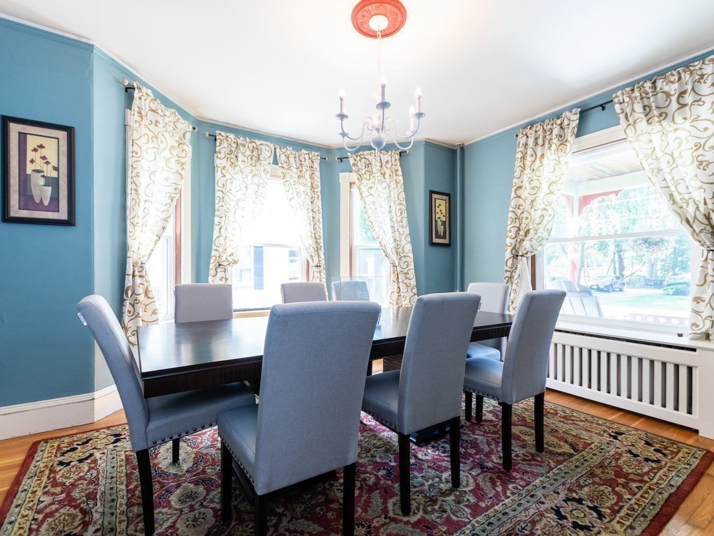 16 Alexander Street Framingham, MA 01702 - Photo 13 of 41 a view of a dining room with furniture window and wooden floor