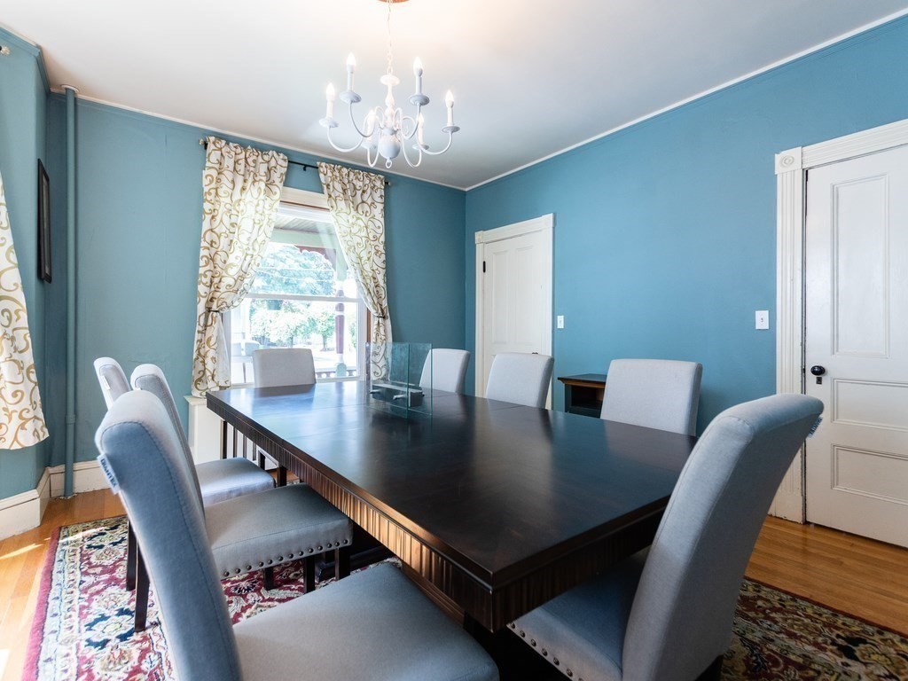 16 Alexander Street Framingham, MA 01702 - Photo 14 of 41 a view of a dining room with furniture window and wooden floor