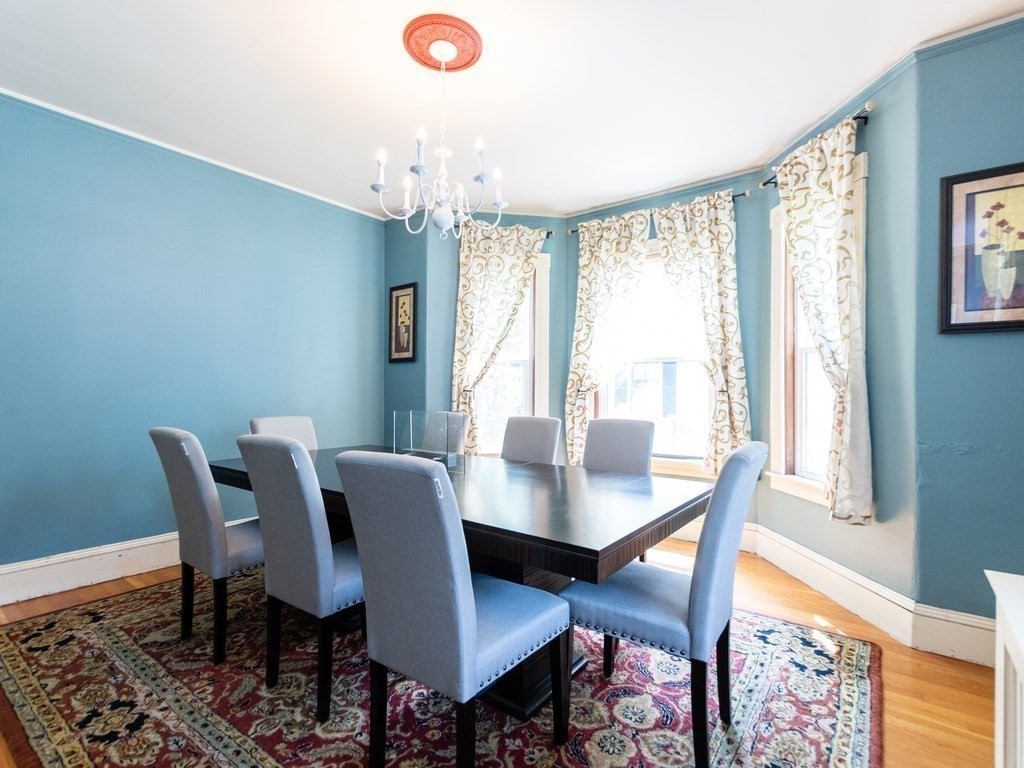 16 Alexander Street Framingham, MA 01702 - Photo 15 of 41 a view of a dining room with furniture window and wooden floor