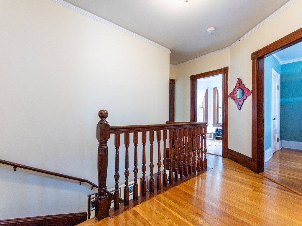 16 Alexander Street Framingham, MA 01702 - Photo 20 of 41 a view of hallway with wooden floor