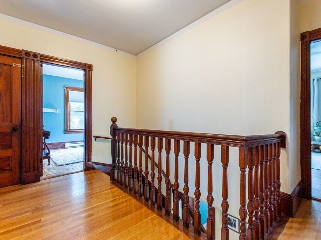 16 Alexander Street Framingham, MA 01702 - Photo 21 of 41 a view of hallway with wooden floor