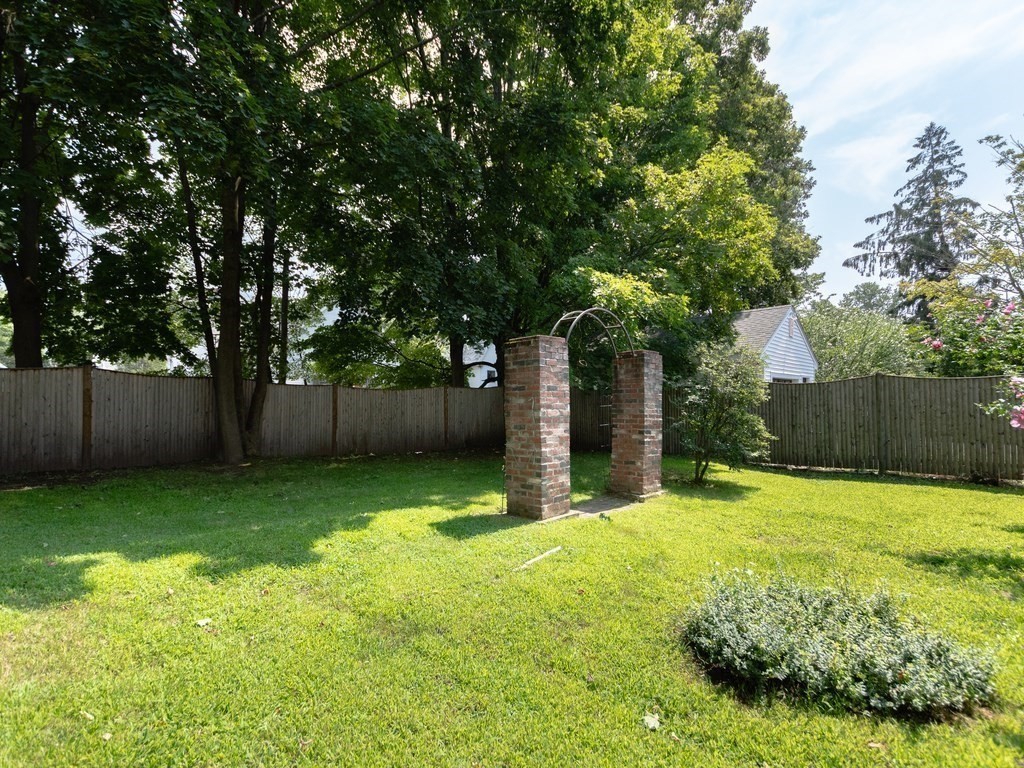 16 Alexander Street Framingham, MA 01702 - Photo 38 of 41 a view of a backyard with large trees