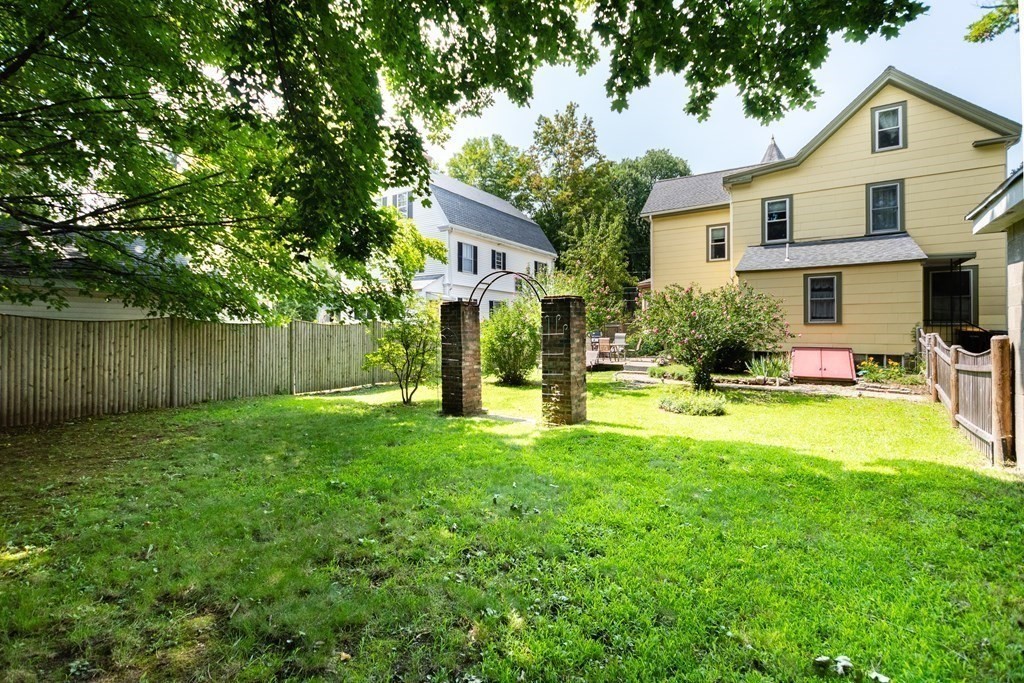 16 Alexander Street Framingham, MA 01702 - Photo 39 of 41 a view of a house with backyard and a tree