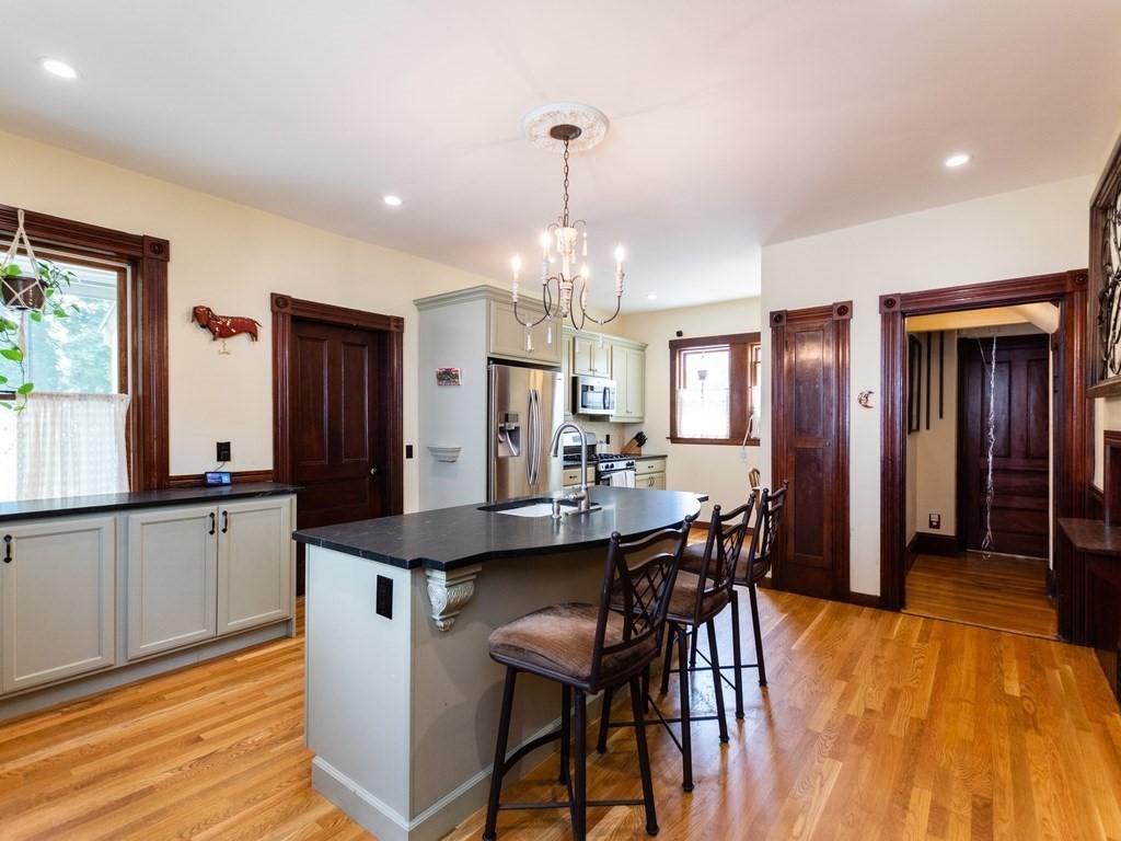 16 Alexander Street Framingham, MA 01702 - Photo 6 of 41 a view of a dining room with furniture and window