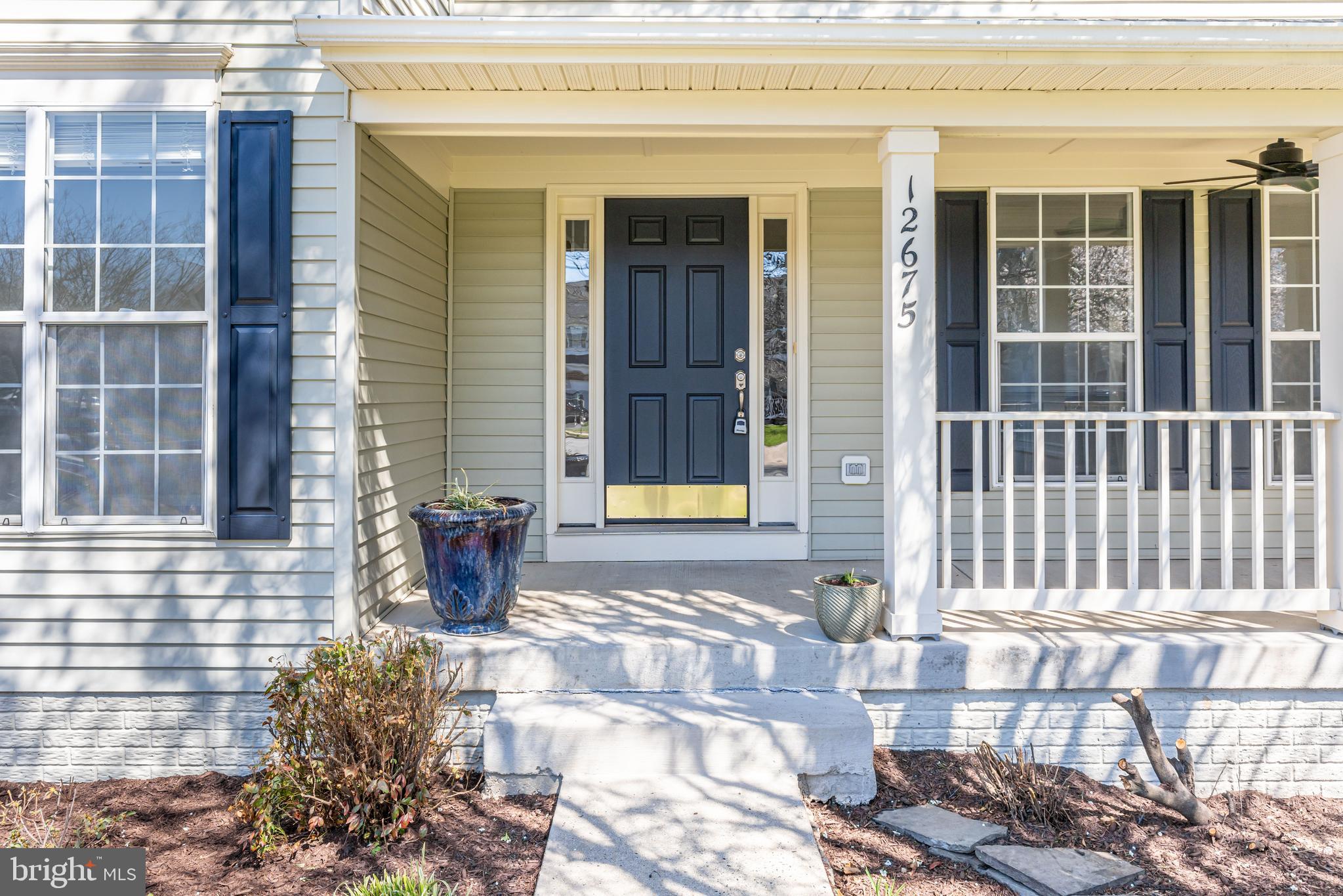 12675 Rushing Creek Court Bristow, VA 20136 - Photo 2 of 49 a view of entrance door of the house