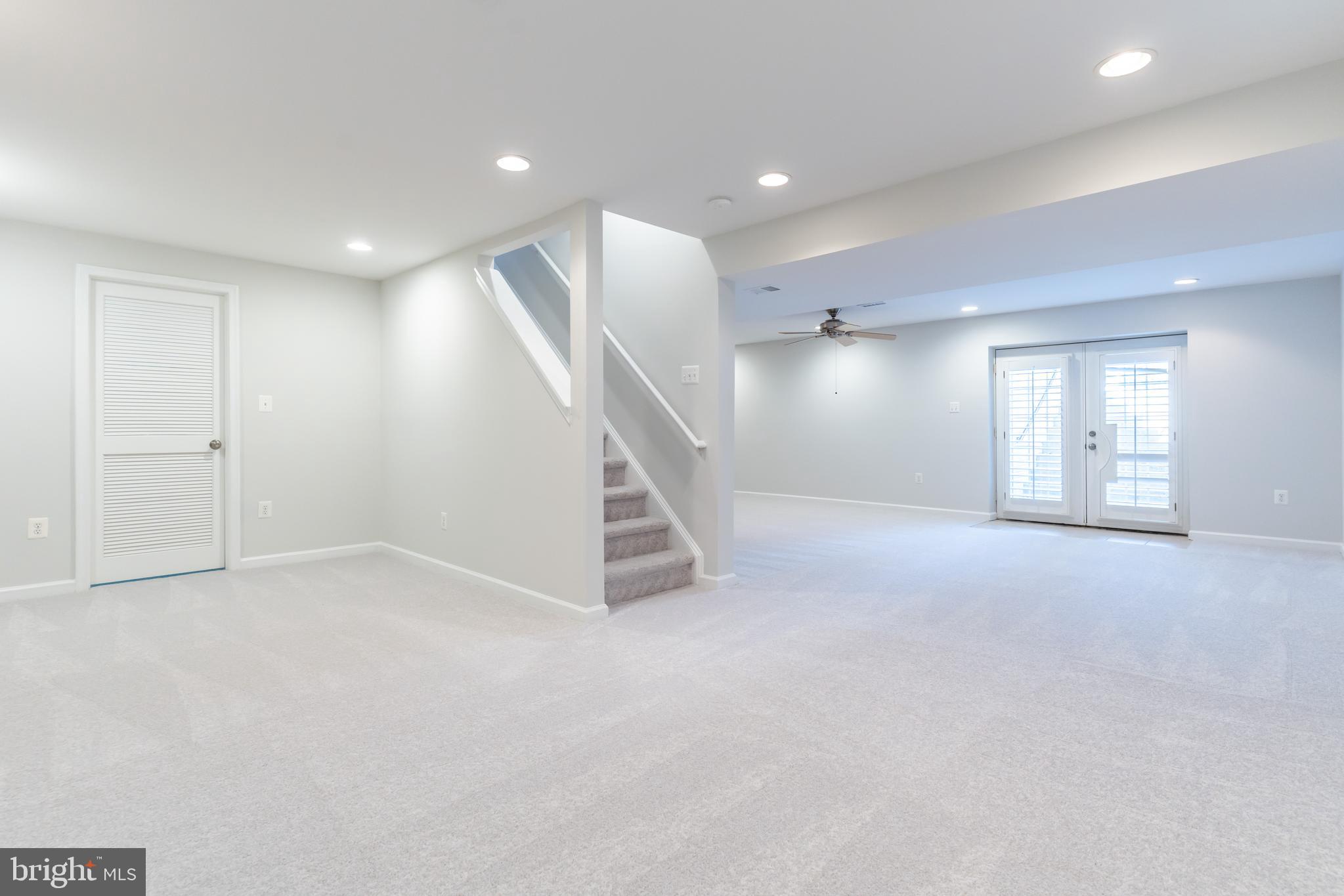 12675 Rushing Creek Court Bristow, VA 20136 - Photo 32 of 49 a view of an empty room with wooden floor
