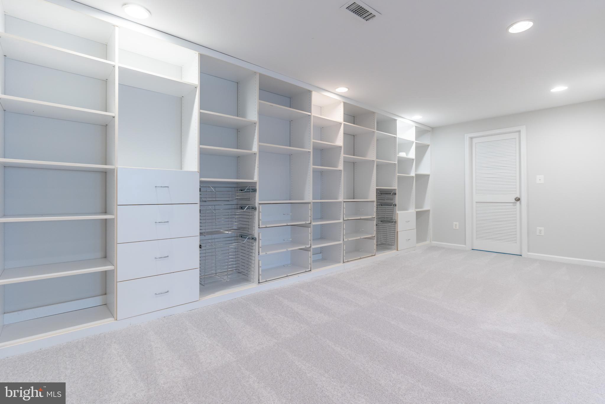 12675 Rushing Creek Court Bristow, VA 20136 - Photo 4 of 49 a view of an empty room with a empty space