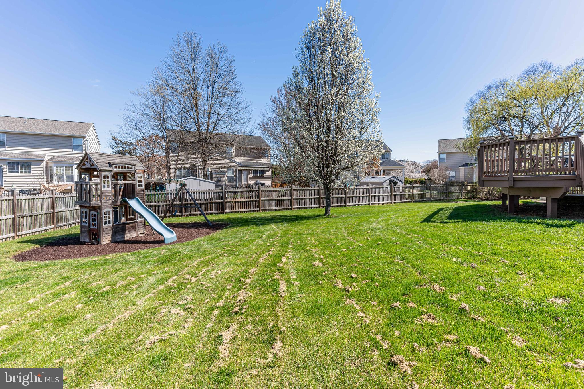 12675 Rushing Creek Court Bristow, VA 20136 - Photo 49 of 49 a view of a house with a yard and sitting area