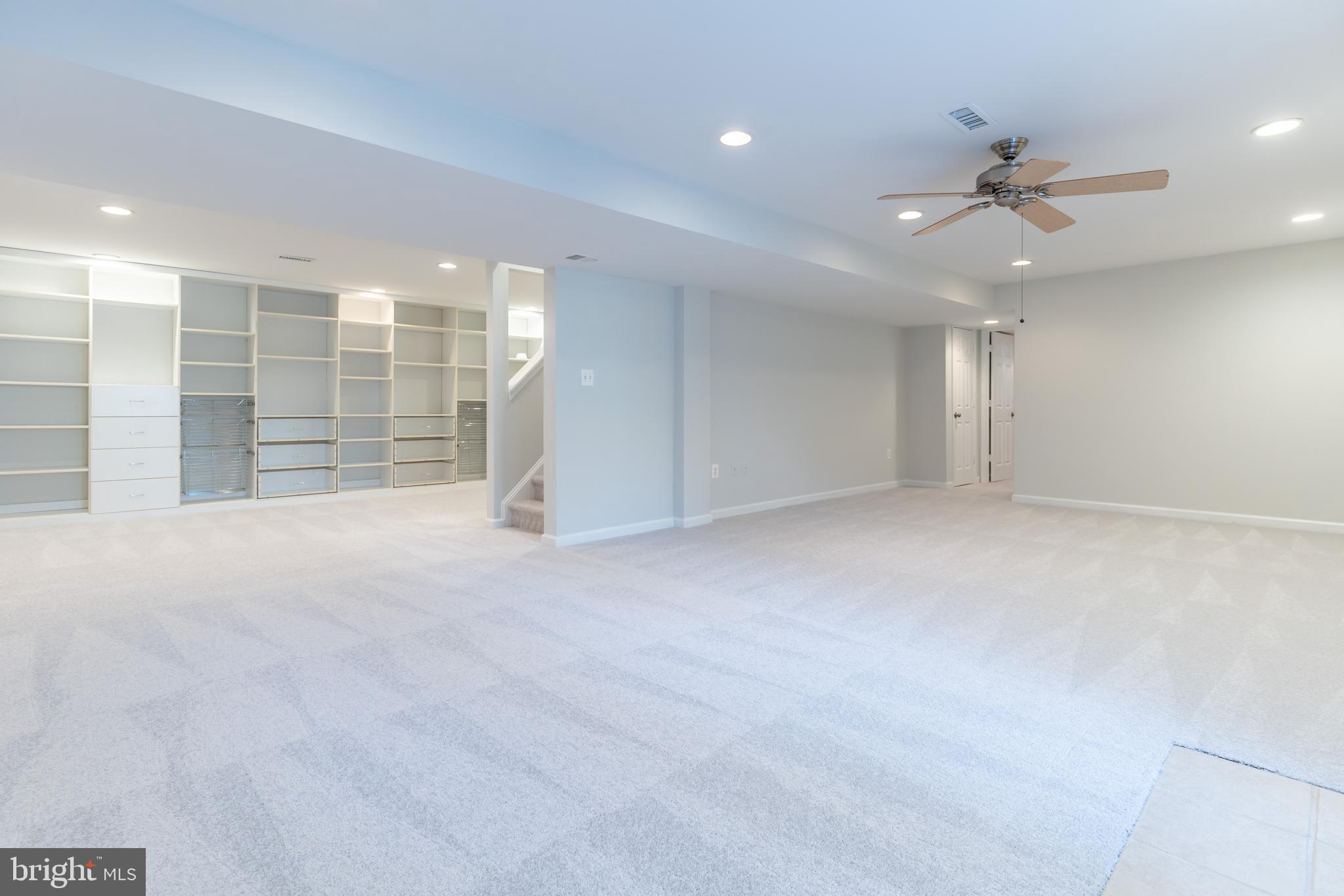 12675 Rushing Creek Court Bristow, VA 20136 - Photo 6 of 49 a view of an empty room with a ceiling fan