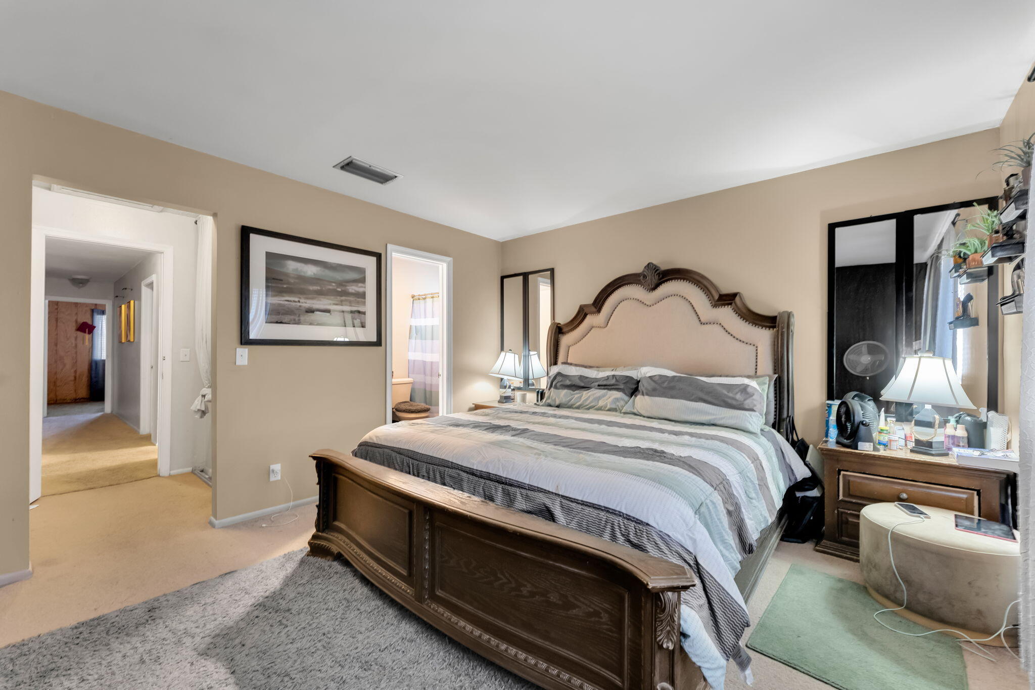 139 Sparrow Drive, Unit 2A Royal Palm Beach, FL 33411 - Photo 19 of 30 a bedroom with bed and a dresser