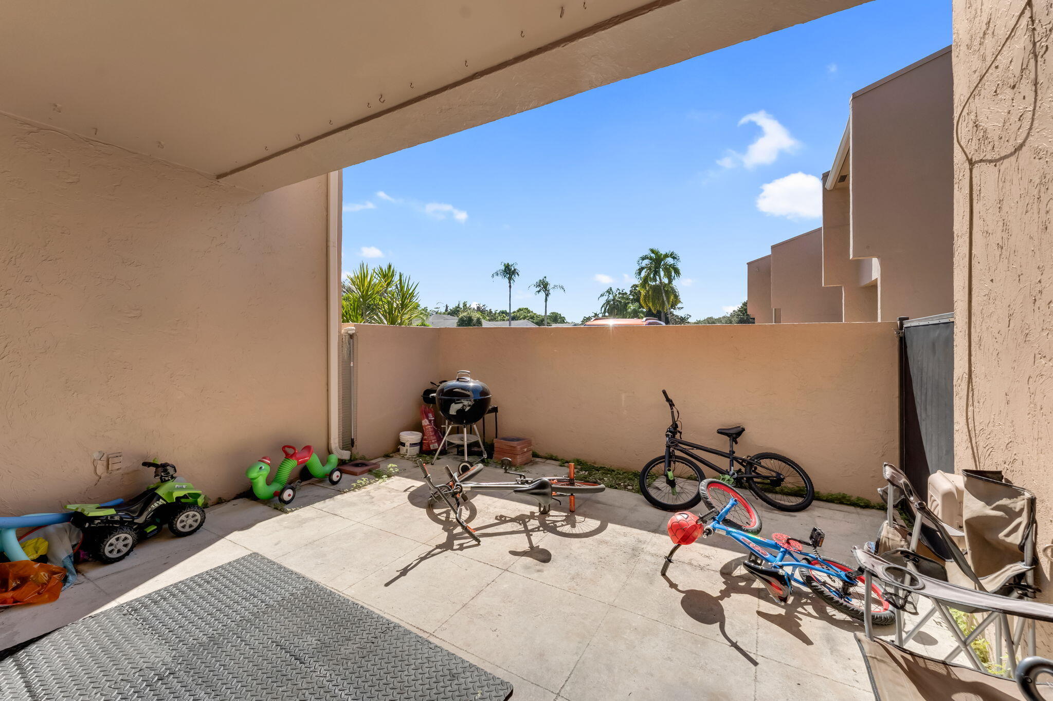 139 Sparrow Drive, Unit 2A Royal Palm Beach, FL 33411 - Photo 30 of 30 a view of a room with gym equipment