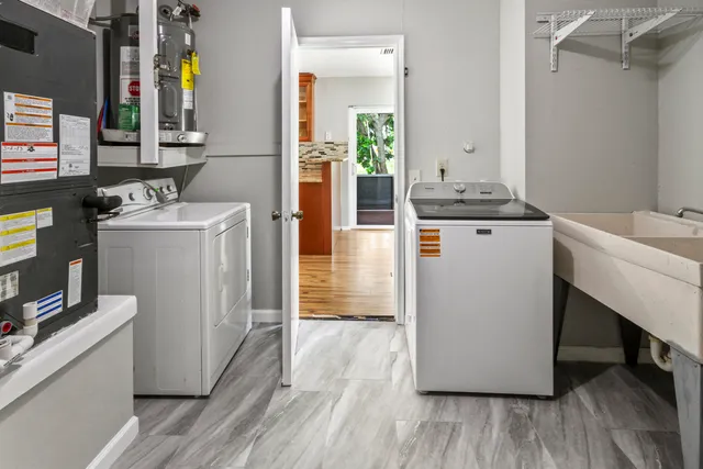 a utility room with washer and dryer