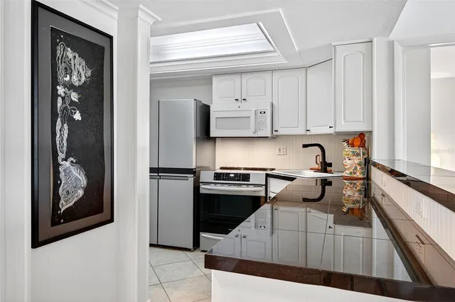 $495,000 | 2100 Benjamin Franklin Drive, Unit 203, Sarasota, FL 34236