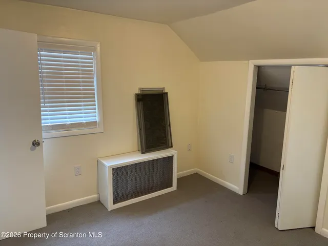 a bathroom with a sink and toilet