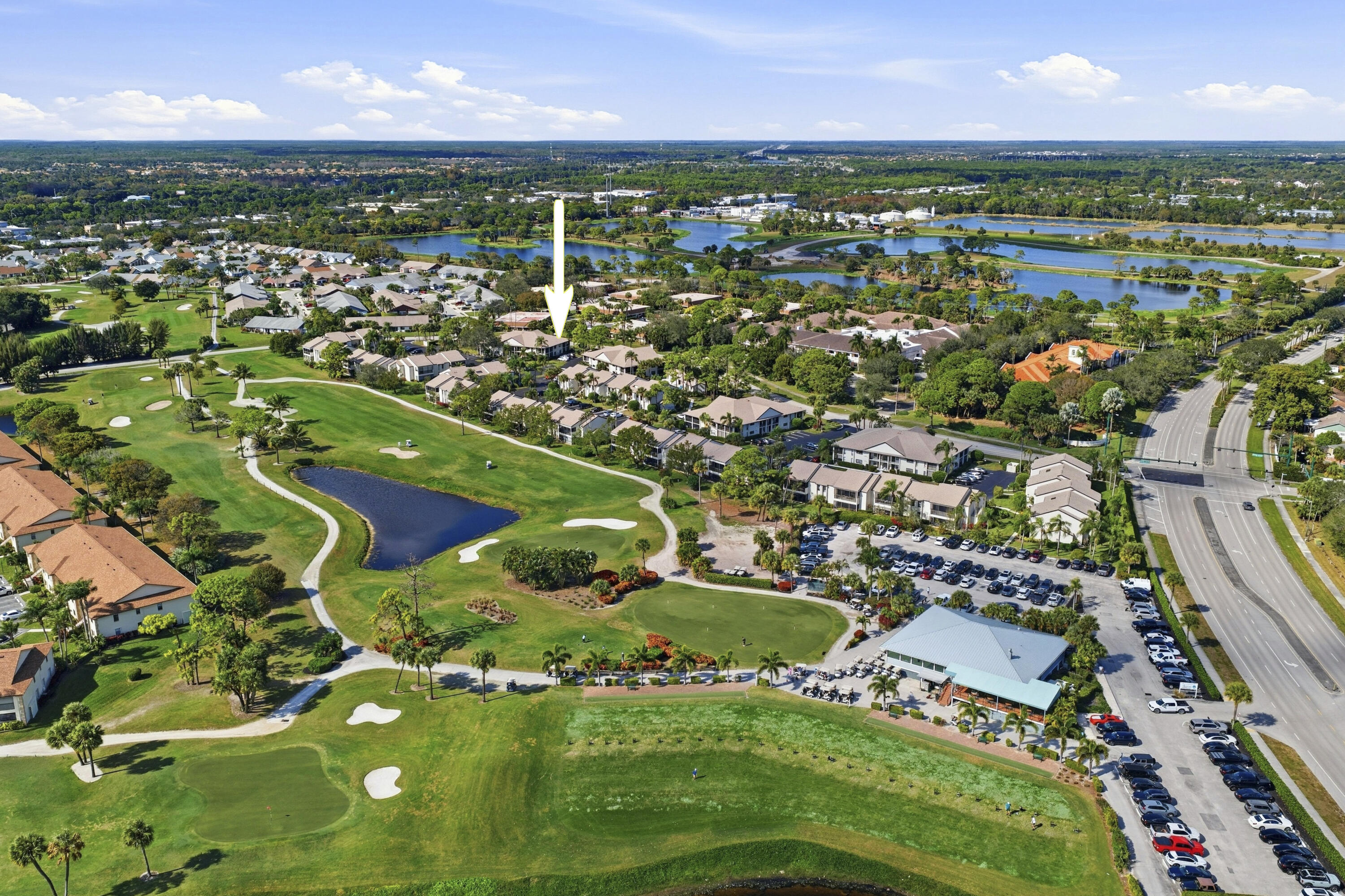 802 Wingfoot Drive, Unit B Jupiter, FL 33458 - Photo 25 of 30 DJI_20260124133515_0160_D_with_grass