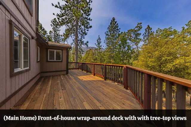 a backyard of a house with a garden and deck