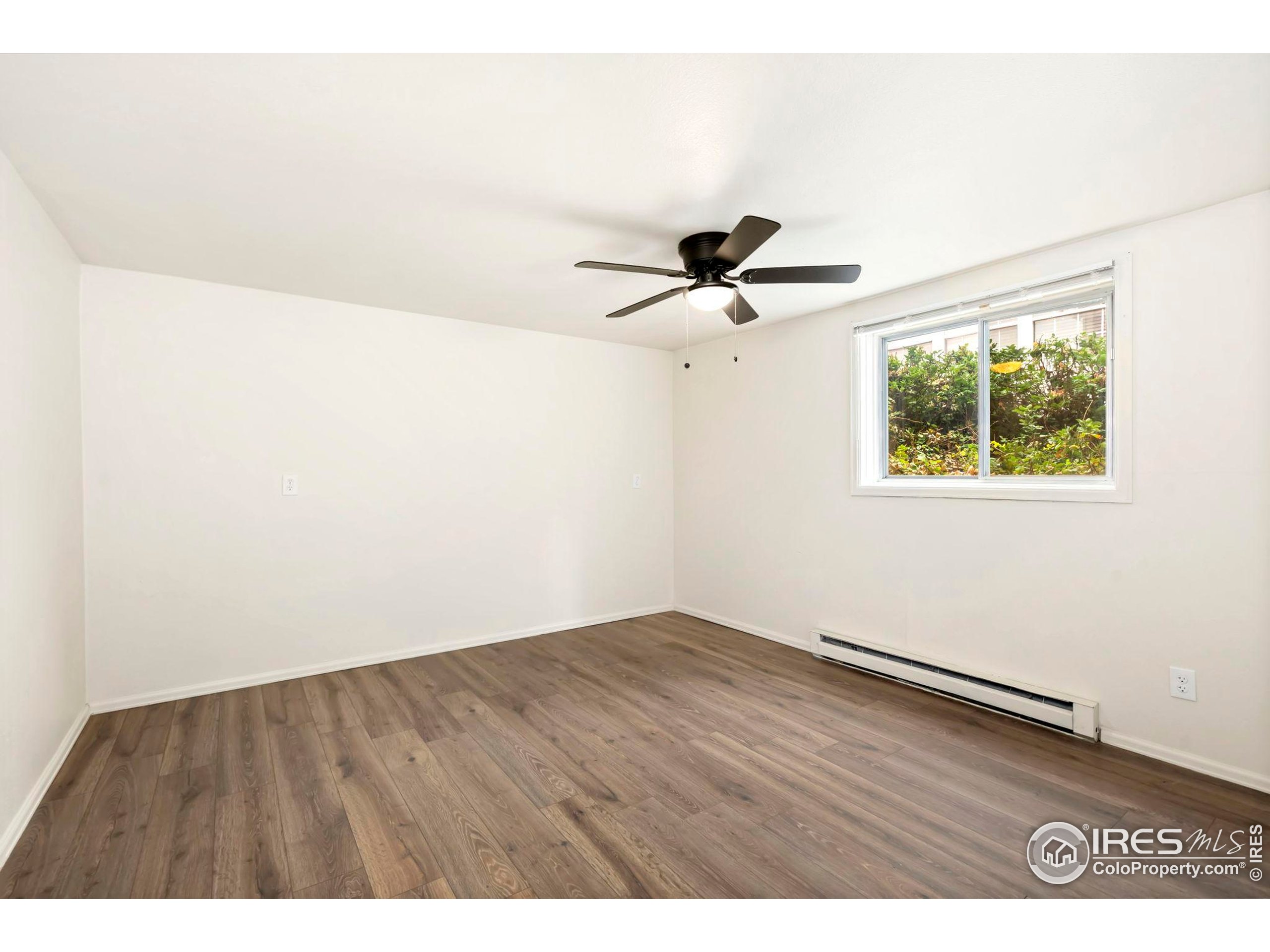 2828 Silverplume Drive, Unit R3 Fort Collins, CO 80526 - Photo 13 of 44 a view of an empty room with a window