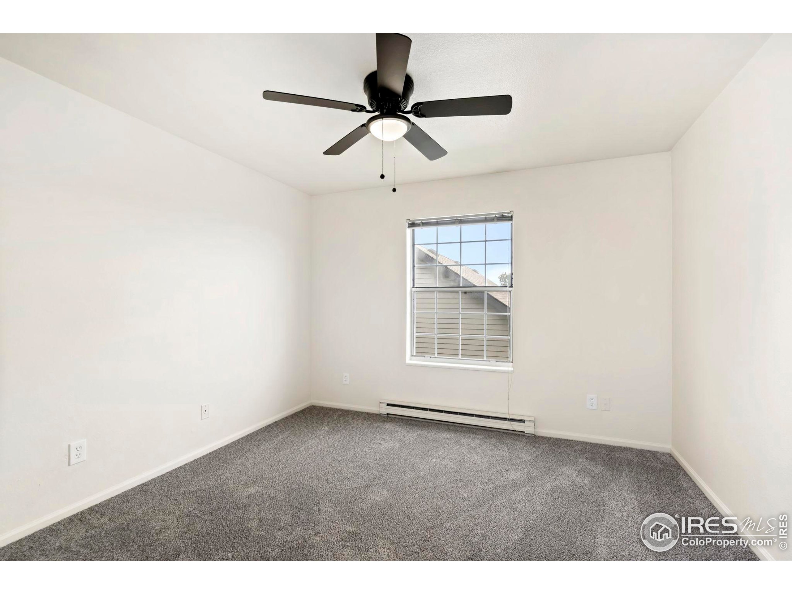 2828 Silverplume Drive, Unit R3 Fort Collins, CO 80526 - Photo 18 of 44 a view of an empty room with a window