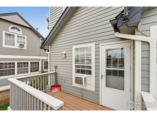 a balcony view with a seating space