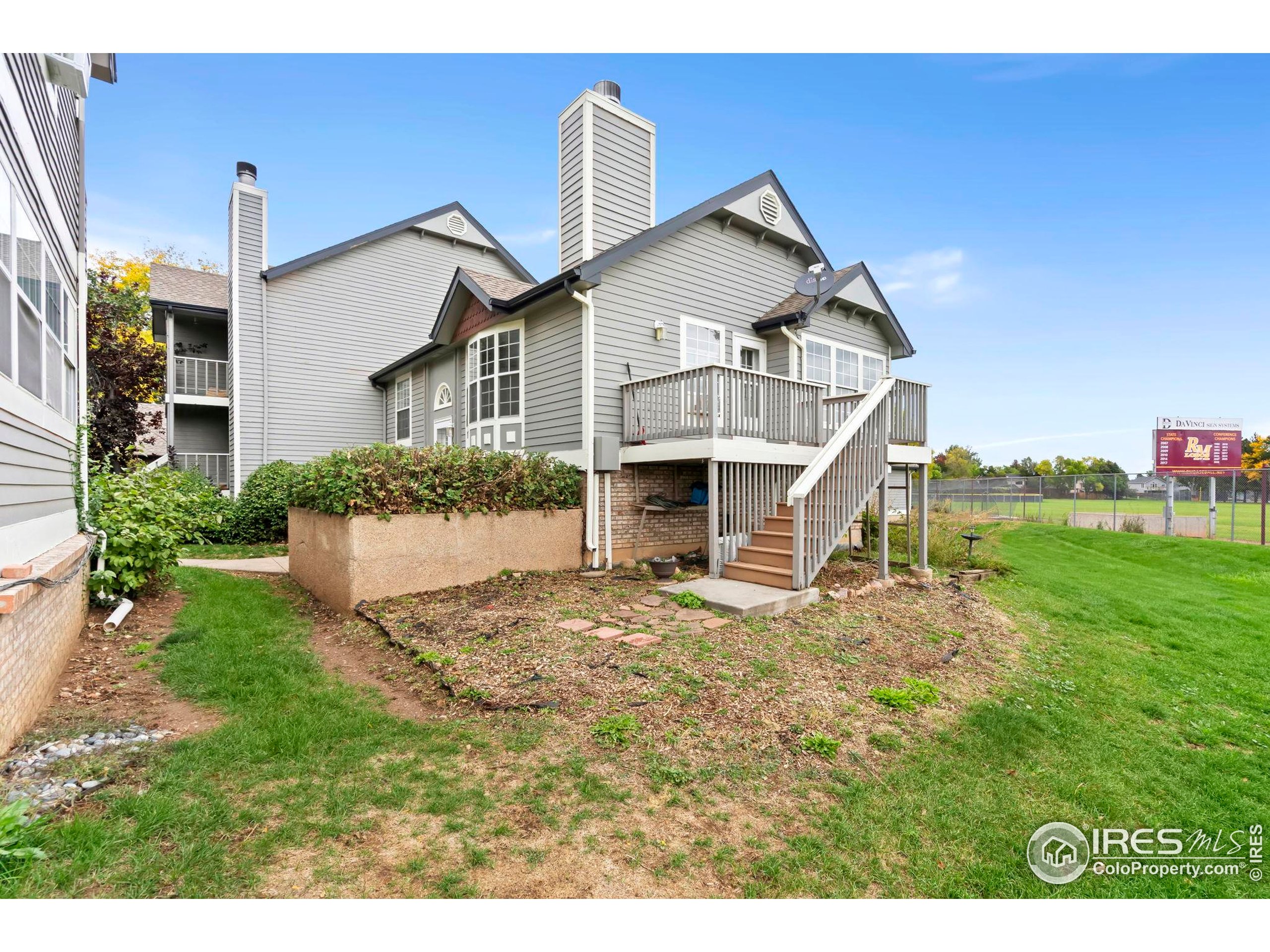 2828 Silverplume Drive, Unit R3 Fort Collins, CO 80526 - Photo 32 of 44 a front view of a house with a yard
