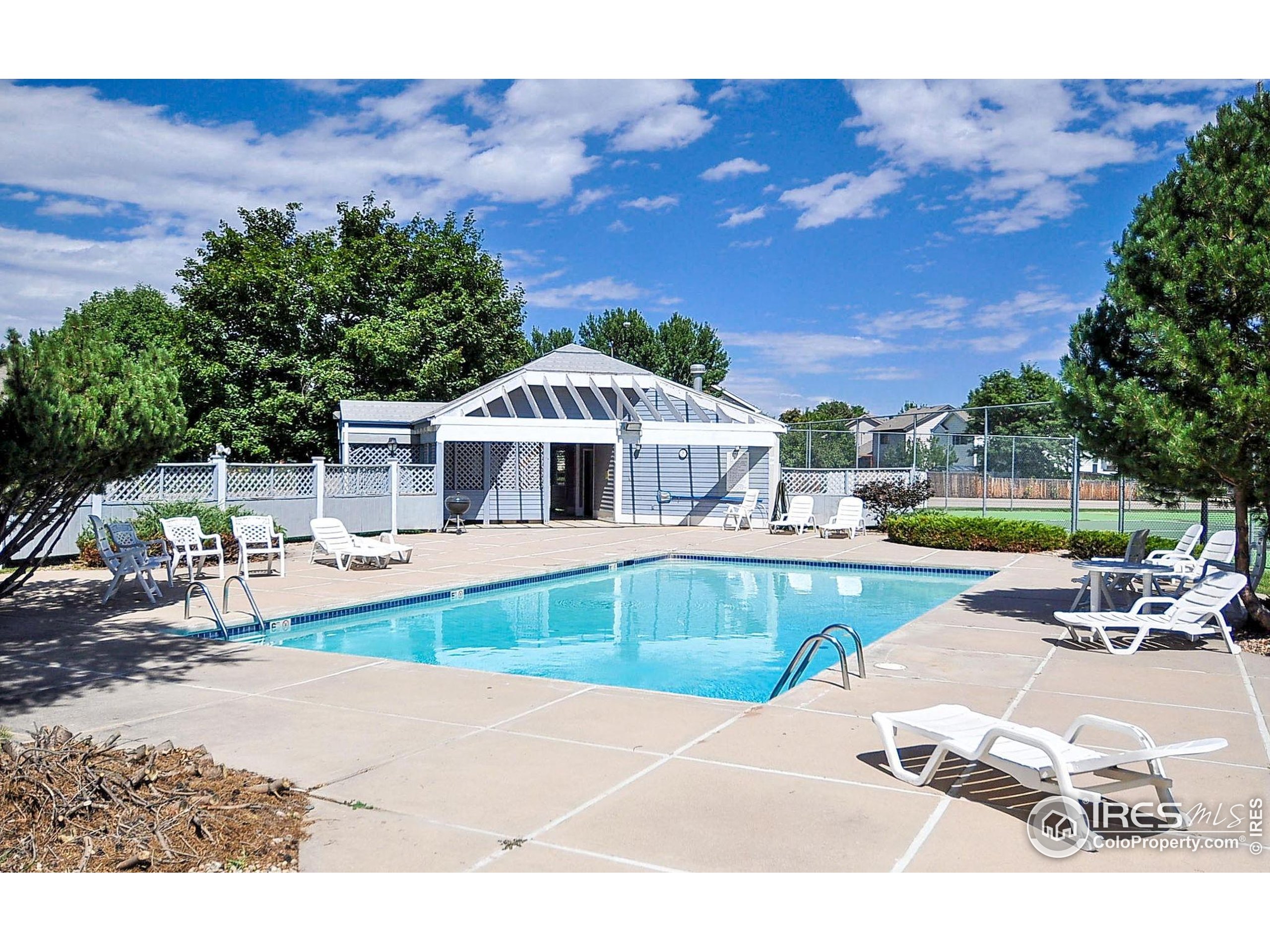 2828 Silverplume Drive, Unit R3 Fort Collins, CO 80526 - Photo 43 of 44 a house with swimming pool in front of it