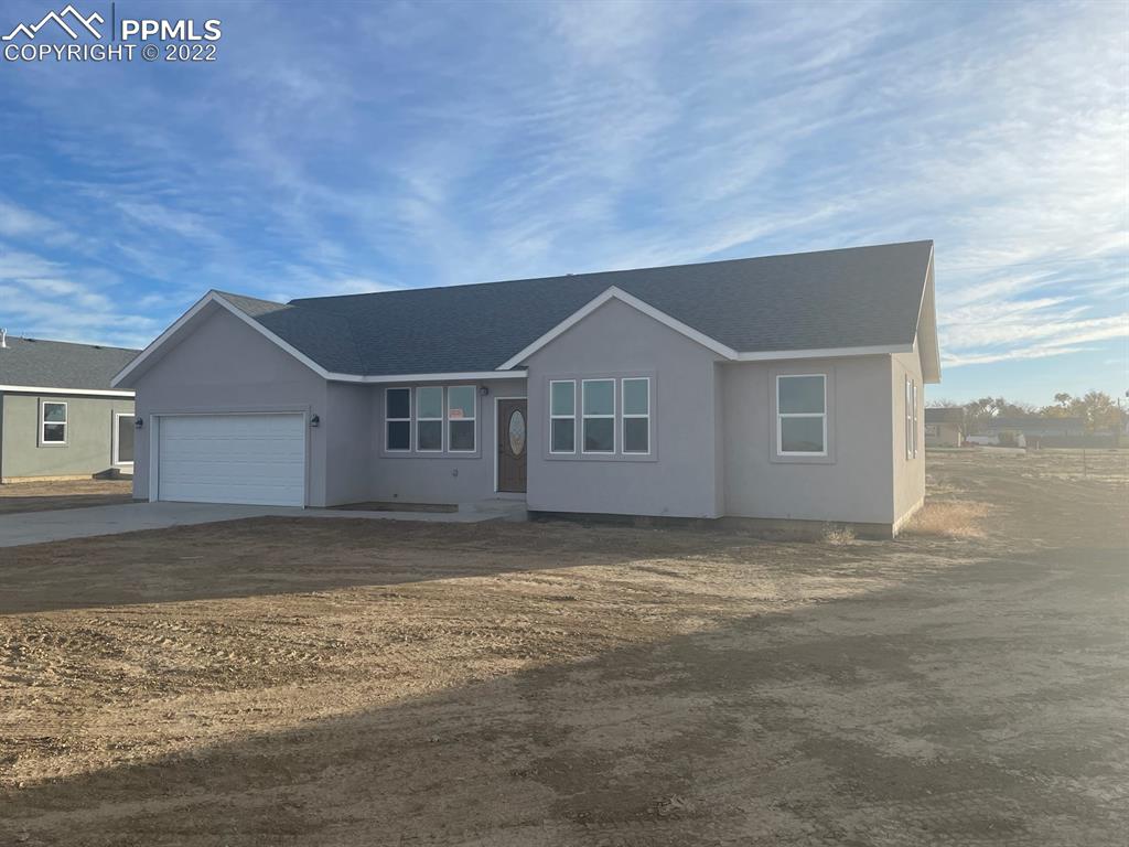 419 Sunset Avenue Ordway, CO 81063 - Photo 1 of 1 a view of a house with a yard