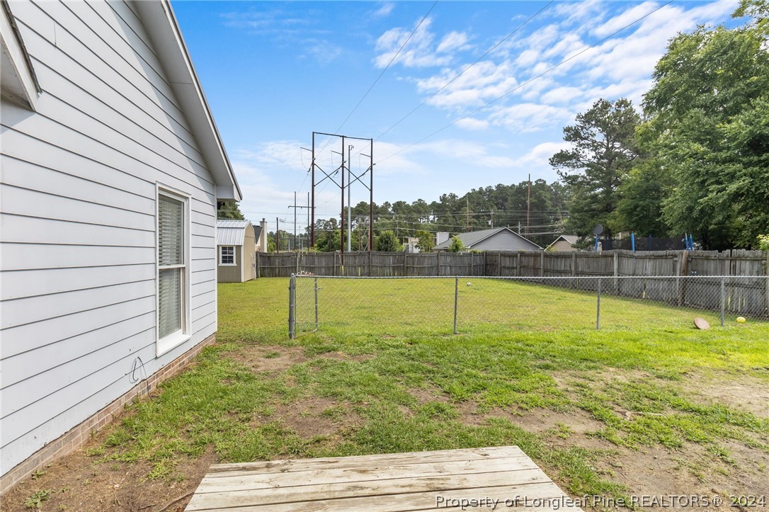 5334 Tory Hill Road Hope Mills, NC 28348 - Photo 22 of 27 a view of a yard with a swimming pool