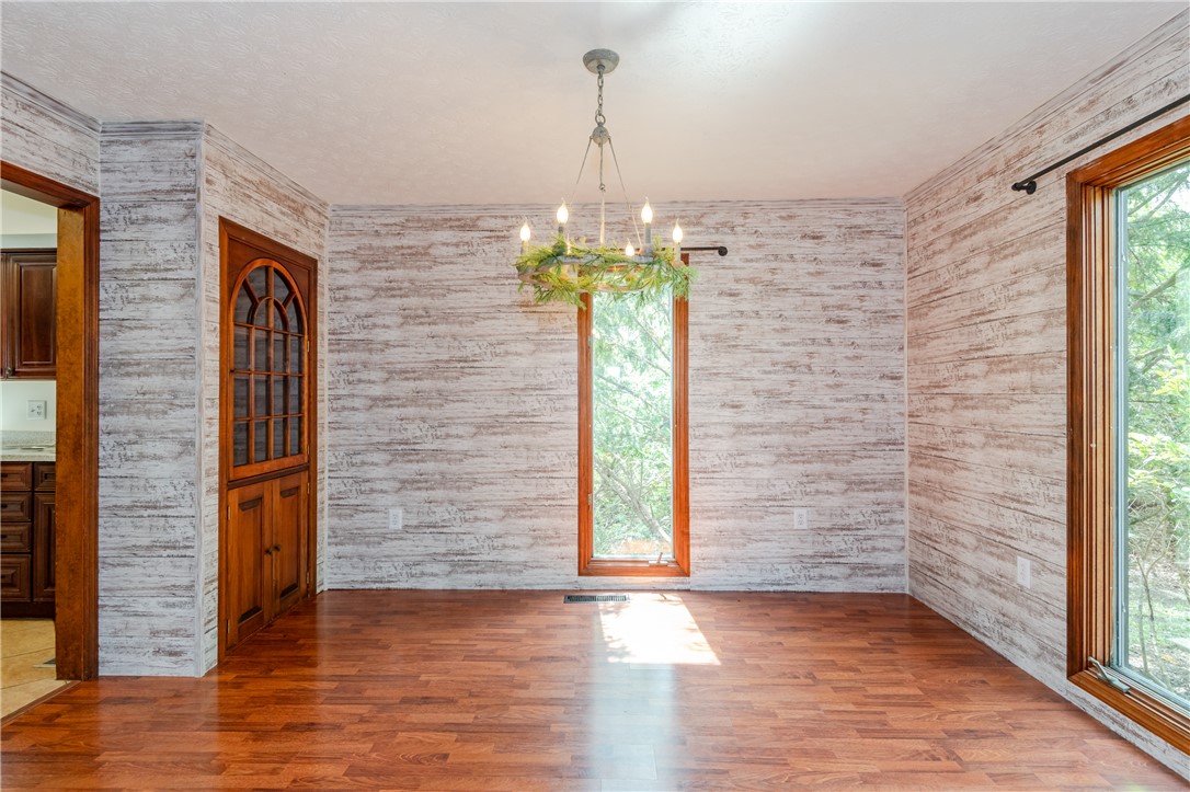 6750 Little Twin Road Germantown, OH 45327 - Photo 7 of 88 This inviting space features rich hardwood floors and abundant natural light from large windows.