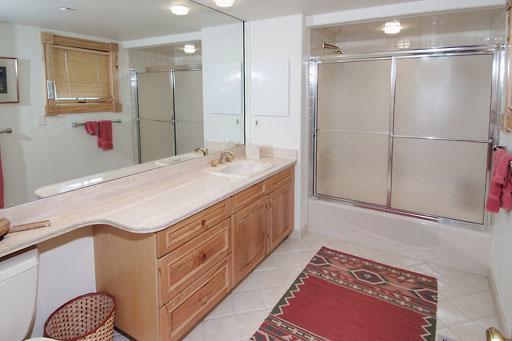 170 Casteel Ridge Edwards, CO 81632 - Photo 16 of 24 a bathroom with a sink vanity and a mirror