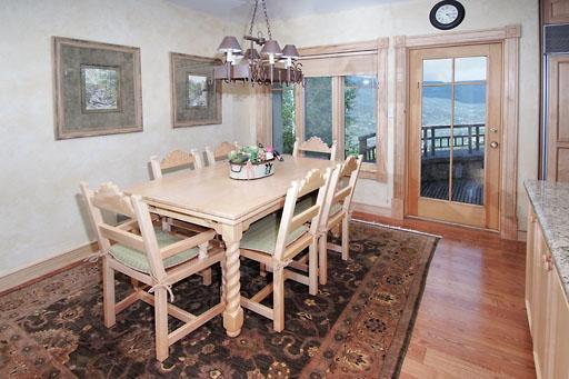 170 Casteel Ridge Edwards, CO 81632 - Photo 5 of 24 a view of a dining room with furniture window and wooden floor