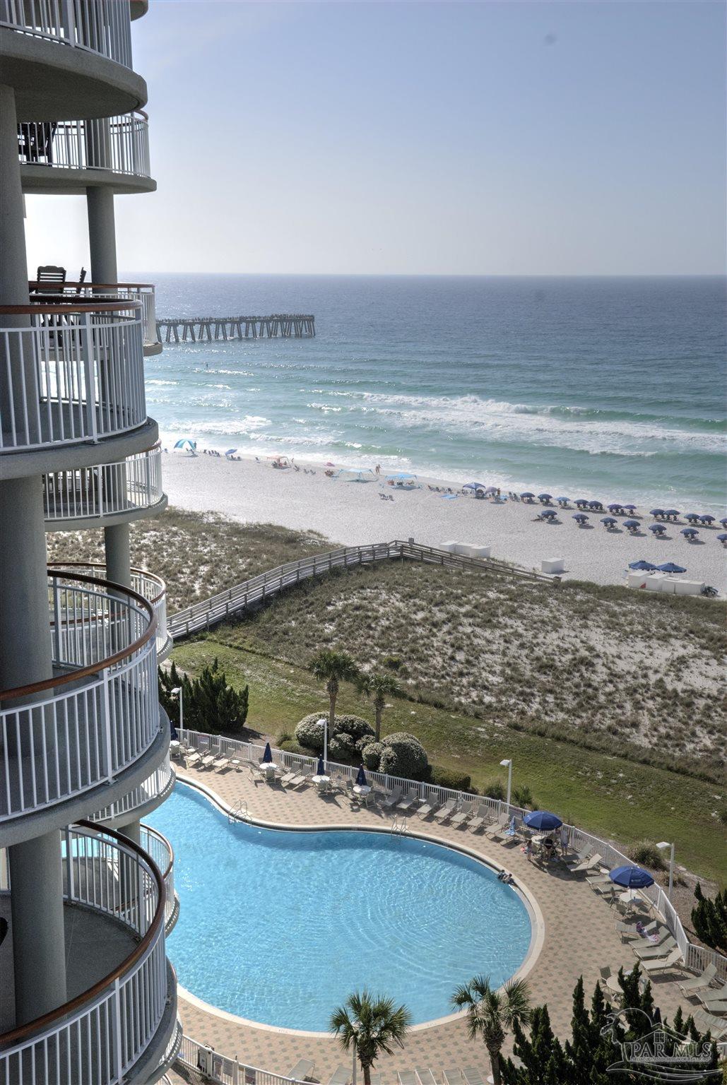 8501 Gulf Boulevard, Unit 10F Navarre, FL 32566 - Photo 9 of 35 a view of a swimming pool with an ocean view