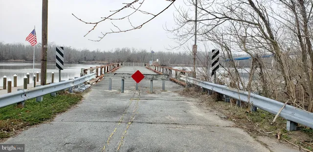 a sign board with parking space
