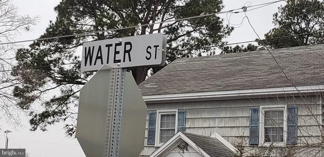 a sign board with parking space