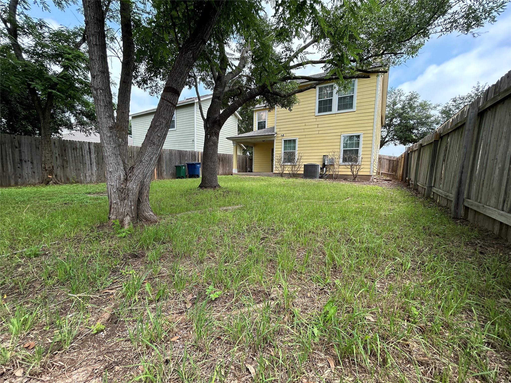 1909 Tranquilo Trail Austin, TX 78744 - Photo 13 of 14 enjoy hanging out in this shaded and private backyard