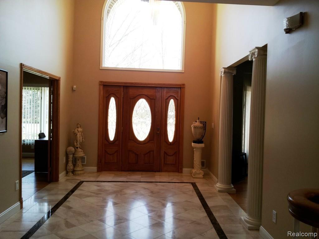 jewell - huge 2-Story Foyer with Marble Floor.jpg