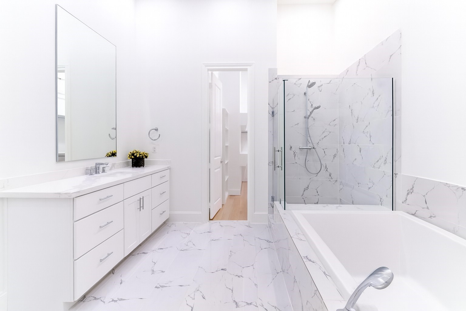 802 Cage Street Houston, TX 77020 - Photo 14 of 15 a bathroom with a tub sink and a mirror