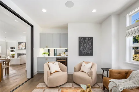 a living room with furniture and window